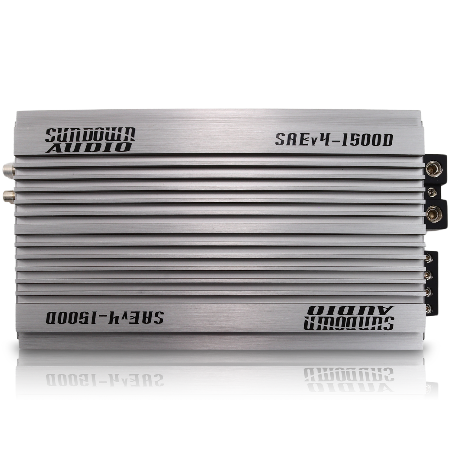 The image showcases a sleek silver SAEv4-1500.1D Class D amplifier by Sundown Audio, with its name etched on the metallic casing. This powerful device features parallel grooves and advanced protection circuitry for optimal performance.