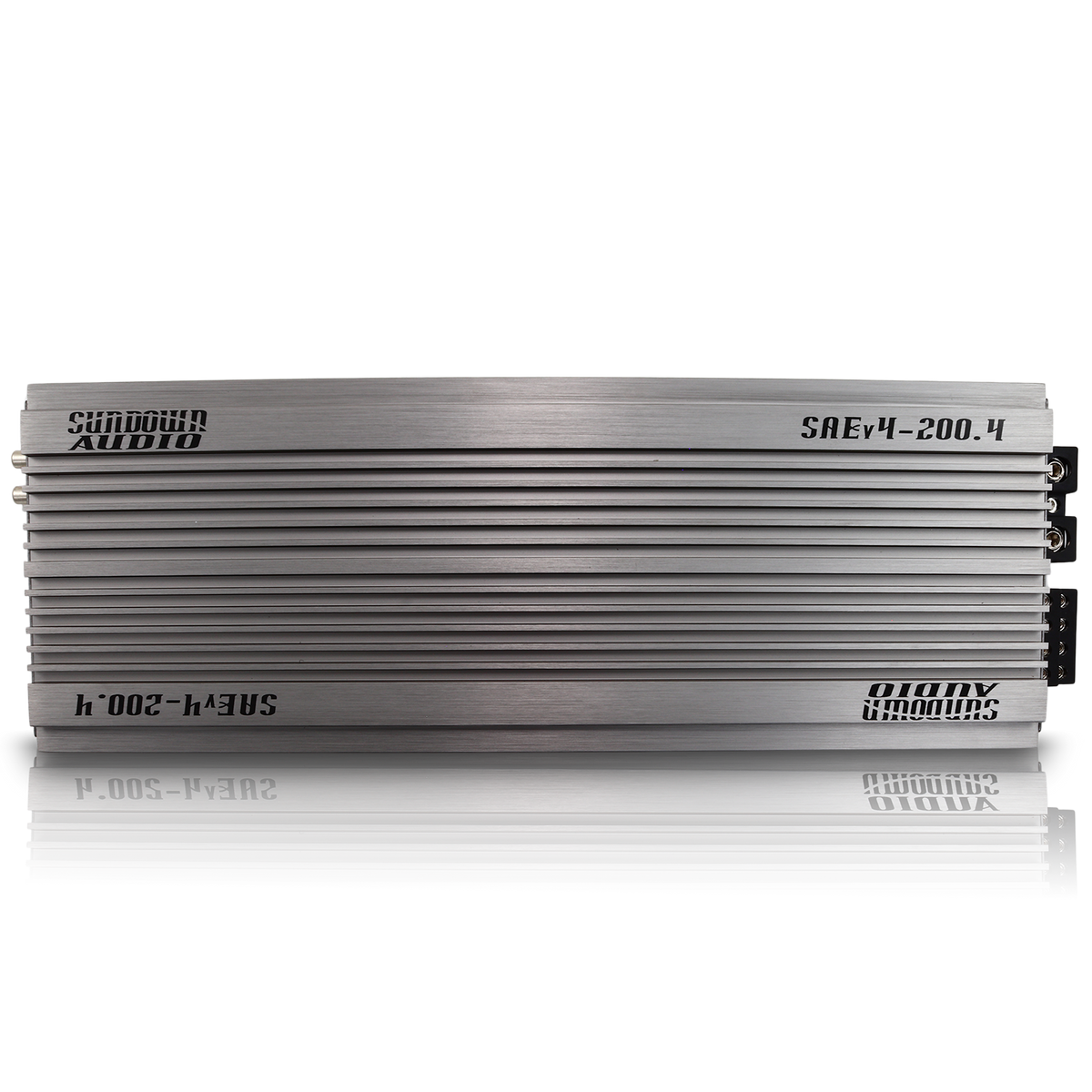 The front view of the silver Sundown Audio SAEv4-200.4 amplifier features a ribbed design displaying the brand and model. With a high-fidelity Class A/B design, it enhances sound quality, with connectors and ports located on one side.