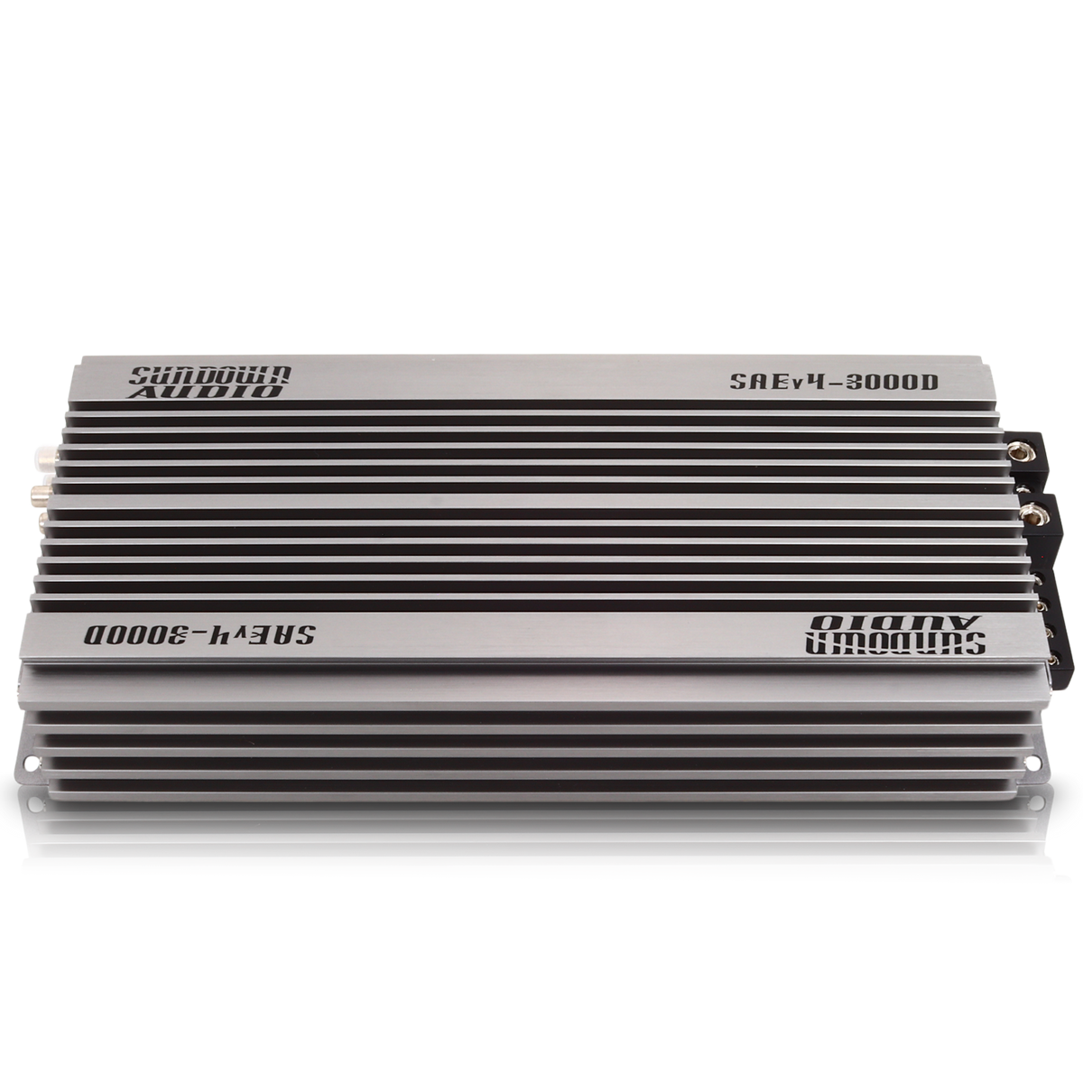 The Sundown Audio SAEv4-3000.1D is a silver Class D car audio amplifier with SAE V.4-3000D and Sundown Audio on top, featuring a ribbed design, side connection ports, and protective circuitry for optimal performance.