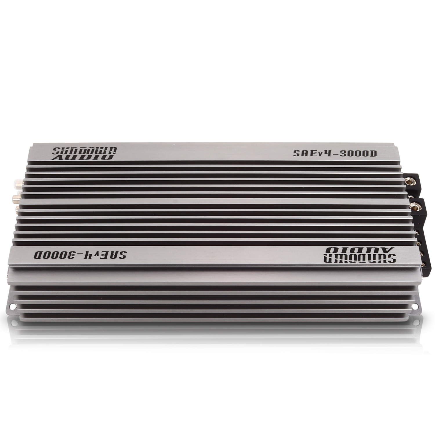 The Sundown Audio SAEv4-3000.1D is a silver Class D car audio amplifier with SAE V.4-3000D and Sundown Audio on top, featuring a ribbed design, side connection ports, and protective circuitry for optimal performance.