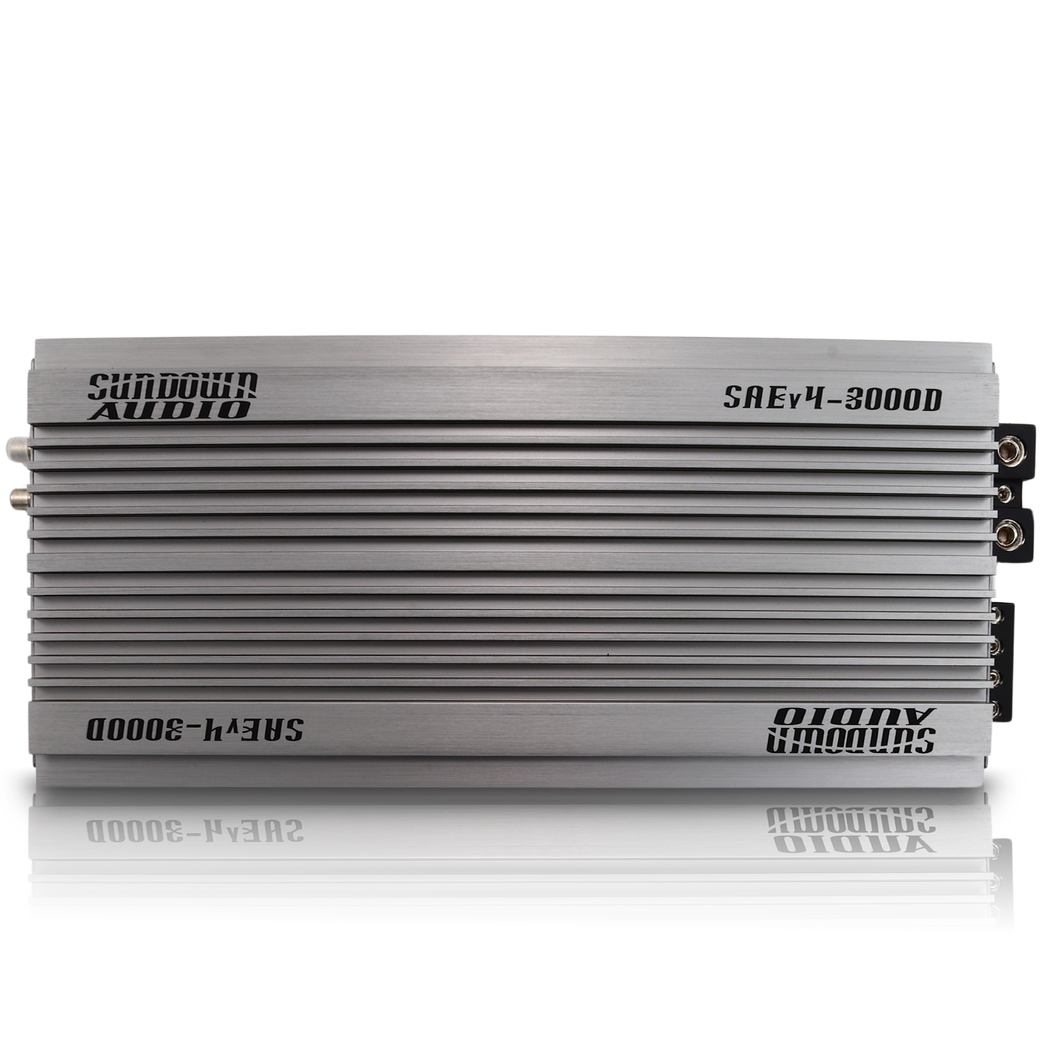 The silver SAEv4-3000.1D Amplifier by Sundown Audio showcases a sleek, horizontal finned design with top branding. This Class D amplifier includes advanced protective circuitry, ideal for enhancing any high-quality car audio system.
