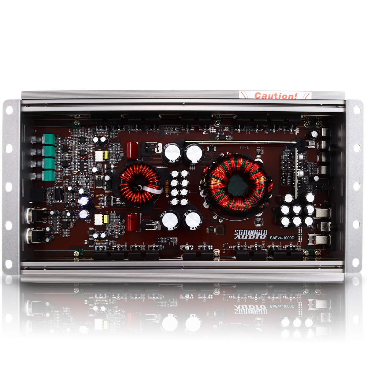 The image features the internal components of a Sundown Audio SAEv4-1000.1D Mono Amplifier, showing two circuit boards with capacitors, resistors, and a large circular coil with red and black wires typical of a Class D amplifier.