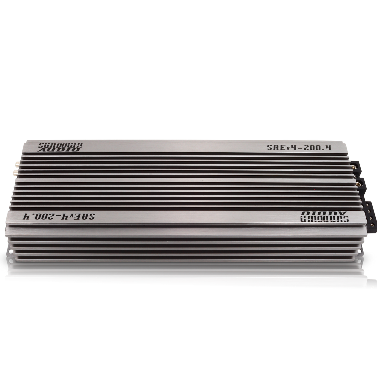 The silver SAEv4-200.4 4-channel amplifier by Sundown Audio has a sleek metallic finish and compact design, with black horizontal fins. Its high-fidelity Class A/B design is perfect for enhancing in-vehicle audio systems, offering superior sound quality.