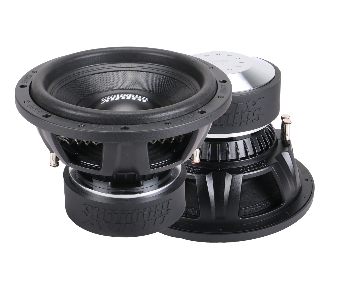 Two Sundown Audio SA-Series v.3 12 subwoofers with dual voice coils, featuring metallic and rubber components, stand side by side on a plain background. Their detailed texture and brand logos enhance the enclosure, showcasing an impressive RMS capability of 1250 watts.