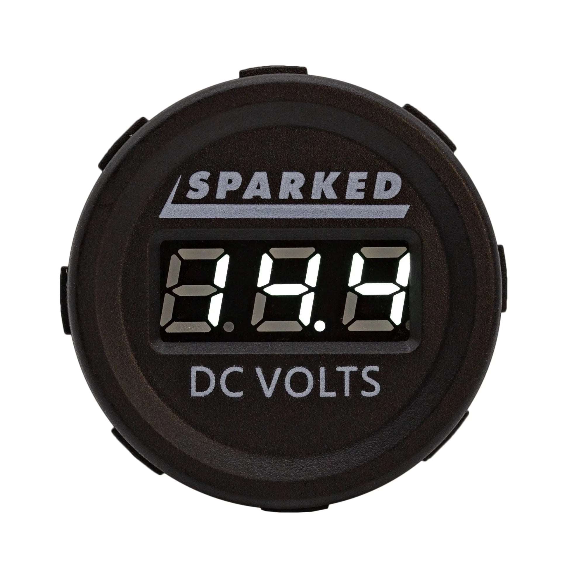 A round digital voltmeter with a black casing, featuring the brand name Sparked Innovations at the top and labeled with "DC VOLTS" at the bottom. This Single 12VDC Voltmeter Battery Voltage Monitor offers an IP67 waterproof design and includes an LED display showing 8.8.8.