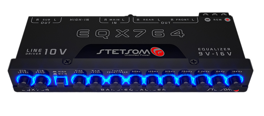 The image showcases the Stetsom EQX764 - 7 Band EQ Equalizer, emphasizing its distinctly labeled knobs and settings designed for precise audio equalization. The blue-lit controls accentuate the frequency adjustments, while displaying input and output capabilities, including specialized subwoofer outputs.