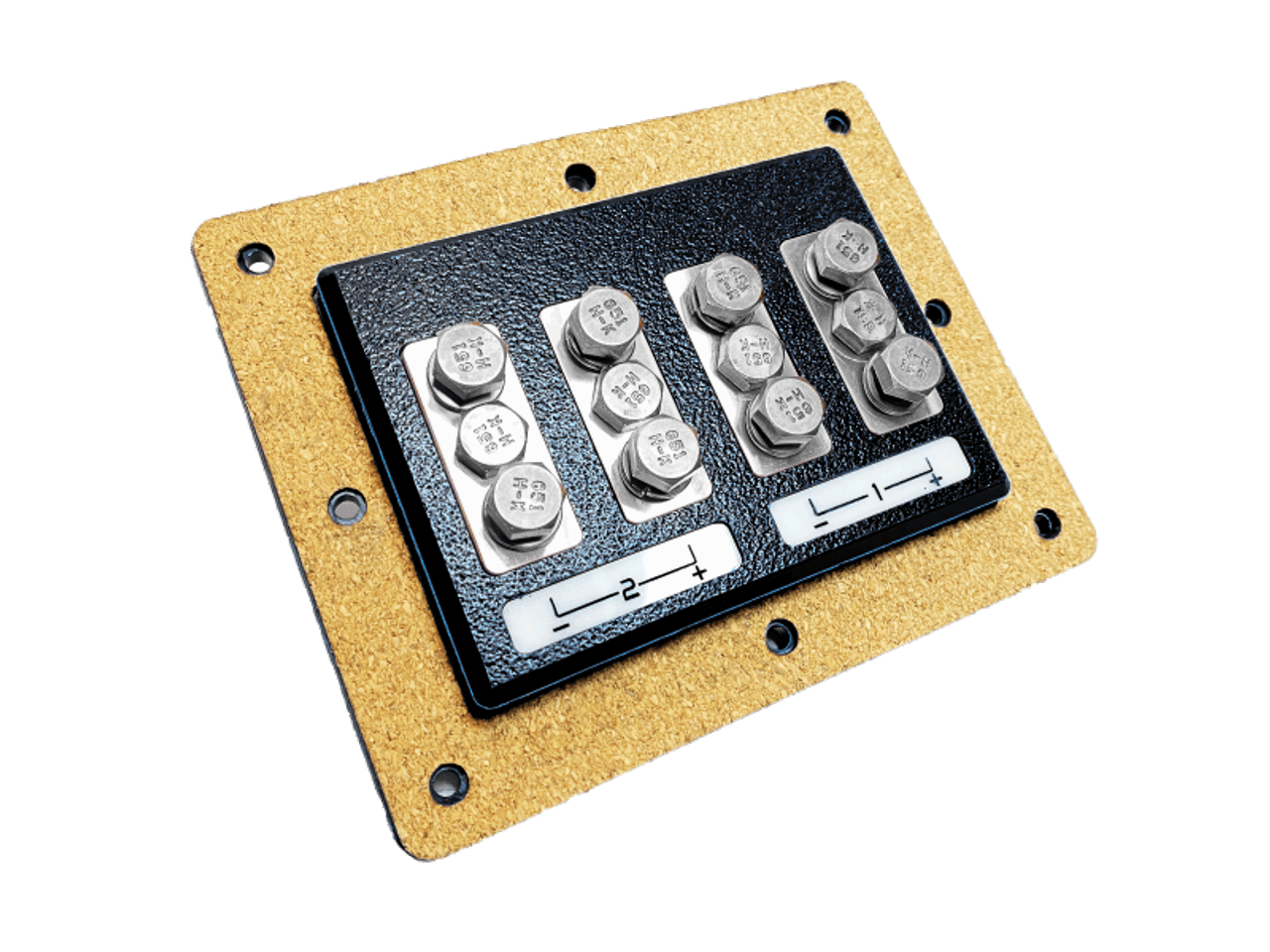 Close-up of the SMD 2 Channel Speaker Terminal X-2 (TX-2) by Steve Meade Designs, showcasing a rectangular metallic and black design with multiple hexagonal bolts and labeled sections. The component features a textured frame with four corner holes for mounting, seamlessly integrating the bolt terminal design.